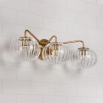 Cedric Modern Brass Spherical Glass Wall Light